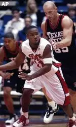 Robert Tomaszek guards SMU's Bryan Hopkins during the first half.
