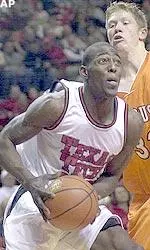 Joseph Works goes up for a shot under Sam Houston State's Aaron Wade during the first half.