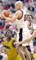 Robert Tomaszek  pulls down a rebound in the second half of Tech's victory.