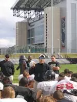 Head Coach Mike Leach addresses the players prior to Saturday's workouts.