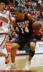 Texas Tech's Andre Emmett looks to get past ISU's Jackson Vroman