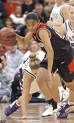 Texas Tech guard Erin Grant drives to the basket against No. 7 Kansas State.