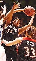 Texas Tech center Plenette Pierson pulls down one of her 17 rebounds against Duke, Monday.