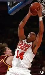 Andre Emmett goes up for two of his 23 points in the victory over Minnesota.