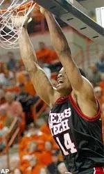 Andre Emmett stuffs home two of his 15 points.