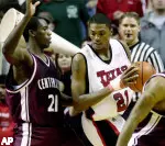 Devonne Giles works toward the basket against Centenary's Chad Maclies during the first half.