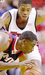 Devonne Giles guards Southern Methodist's Ike Ofoegbu.