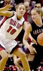 Brooke Baughman guards Arkansas-Little Rock's Rachel Smith.