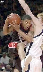 Andre Emmett, selected to the NABC District 9 First Team for a second straight season, needs four points to become the Big 12 all-time scoring leader.