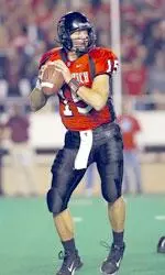 Sonny Cumbie throws for 280 yards on 21-of-31 passing and connects on three scoring strikes in the first spring scrimmage.