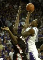 John Ofoegbu tries to block a shot by Kansas State forward Justin Williams during the first half.