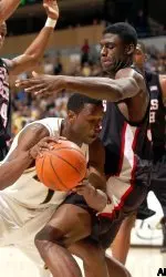 Missouri's Jimmy McKinney tries to get around Texas Tech's John Ofoebu.