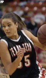 Alesha Robertson pushes the ball up the court against Nebraska.