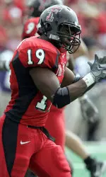 Taurean Henderson claps after rushing for a touchdown in the second quarter against Kansas State.