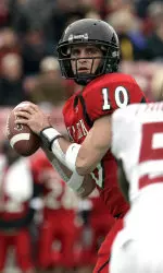 Cody Hodges looks to pass against Oklahoma's Calvin Thibodeaux during the first half of play. (AP Photo/LM Otero)