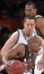 Ronald Ross drives past Oklahoma State's Daniel Bobik.