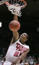 Texas Tech forward Devonne Giles dunks the ball.