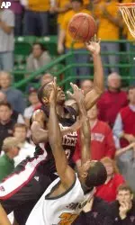 Martin Zeno shoots over Baylor's Tommy Swanson (32) during the second half.