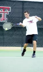 <B>Photo Courtesy Picturemann/Scott Mann</B><P>The Red Raiders defeat No. 39 TCU, 4-3. Szumanski won the clinch match for Tech.