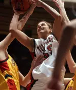 Alesha Robertson is fouled by Iowa State's Mary Fox with three seconds left in the game.
