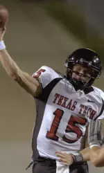 Former Texas Tech quarterback and Holiday Bowl MVP Sonny Cumbie was one of three Red Raiders to sign free agent contracts Sunday.