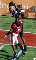 Texas Tech Robert Johnson makes the the reception against Alabama defender Ramzee Robinson in the first quarter of the Cotton Bowl. (AP Photo/LM Otero)
