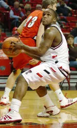 Benny Valentine looks to shoot after driving past Gardner-Webb's defense in the first half. (AP Photo)