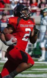 Shannon Woods runs away from the Baylor defense in the third quarter.