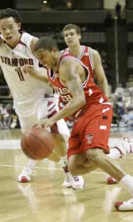 Jarrius Jackson tries to dribble past Stanford's Mitch Johnson.