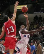 Texas Tech's Decensae White (13) defends Louisiana Tech guard Terry Parker Jr.(AP Photo/Alex Brandon)
