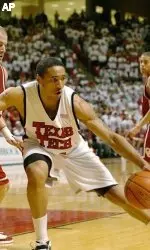 Texas Tech's Dior Lowhorn (21) dribbles inside against Oklahoma's Kevin Bookout (34) in the second half of a college basketball game, Monday night, Feb. 20, 2006, at the United Spirit Arena in Lubbock, Texas. (AP Photo/Joe Don Buckner)