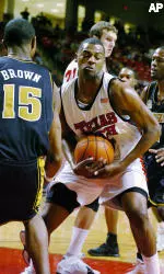 Texas Tech's Darryl Dora reels in a rebound against Missouri's Marshall Brown in the first half. (AP Photo/Lubbock Avalanche-Journal, Joe Don Buckner)