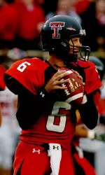 Graham Harrell looks to throw a pass in the first quarter.