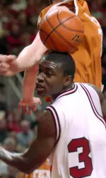 Martin Zeno looks for the basketball after his shot was blocked by Texas' Connor Atchley during the first half.