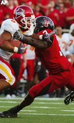 Iowa State's Jason Scales (6) runs into Texas Tech's Jamar Wall (3) during the first quarter.