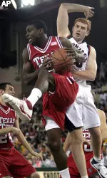 Texas Tech's Martin Zeno, left, grabs the rebound against Gonzaga's Davis Pendergraft.