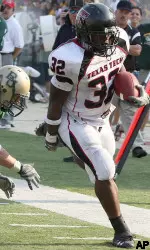 Aaron Crawford scores a touchdown in the first half. (AP Photo/Waco Tribune Herald, Jose Yau)