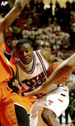 Martin Zeno drives the lane against Oklahoma State's Marcus Dove (5) in the final minute. (AP Photo/Lubbock Avalanche-Journal, Joe Don Buckner)