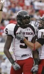 Michael Crabtree celebrates after scoring one of his five touchdowns.