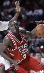 Martin Zeno drives around Oklahoma guard Tony Crocker in the first half. (AP Photo/Sue Ogrocki)