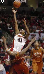 Texas Tech's Dominic Seals (41) shoots against Texas' Brittainey Raven (10) in the first half (AP Photo)
