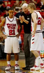 Bob Knight instructs John Roberson and Alan Voskuil during the first half. The Red Raiders defeated UTEP 75-68 to give Knight his 899th coaching career win. (AP Photo/Lubbock Avalanche-Journal, Joe Don Buckner)