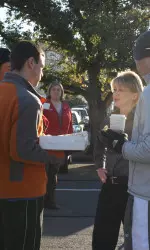 Kristy Curry brought breakfast to the students camped out at Raiderville on Wednesday morning.