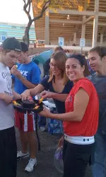 Dani Matthews passes out candy to Raiderville residents.