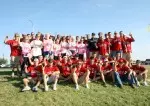 Team with breast cancer survivors at the 2008 Race for the Cure
