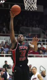 Texas Tech forward Mike Singletary drives to the basket against Stanford in the first half.