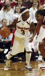 Texas Tech's Maria Moore (3) tries to dribble past Oklahoma's Rose Hammond during the first half (AP Photo)