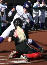 Robyn Wike, tagging out a Washington runner at home, helped lead Tech against Loyola and Arizona State.