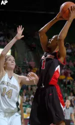 Texas Tech's Dominic Seals shoots in front of Baylor defender Rachel Allison. (AP Photo/Nick Simonite)