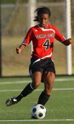 Brittney Harrison completed just the sixth hat trick in school history Sunday afternoon.